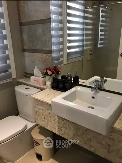 Modern bathroom with stylish sink and elegant decor