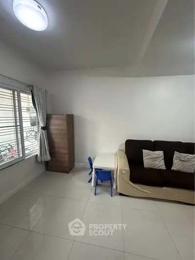 Cozy living room with modern sofa and natural light