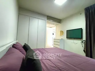 Modern bedroom with stylish decor and built-in wardrobe