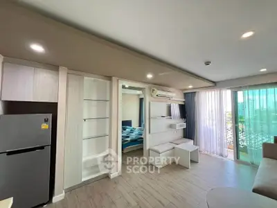 Modern living room with open layout and balcony view