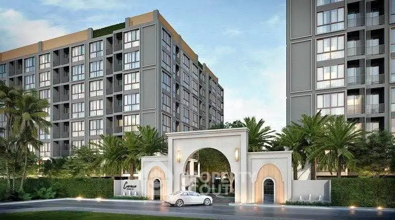 Luxurious modern condominium with grand entrance and lush landscaping