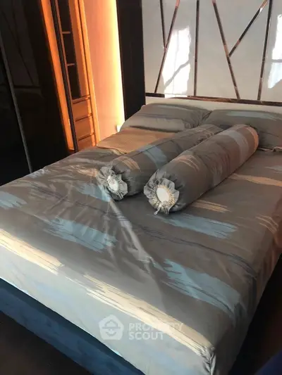 Luxurious bedroom with stylish bedding and modern design elements