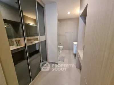 Modern bathroom with sleek design and ample storage space
