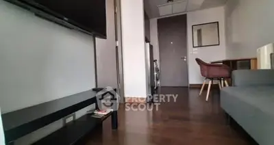 Modern living room with sleek furniture and hardwood floors