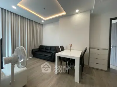 Modern living room with sleek furniture and ambient lighting