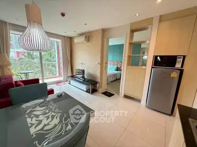 Modern open-plan living room with stylish decor and balcony view