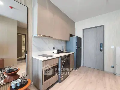 Modern kitchen with sleek appliances and stylish cabinetry