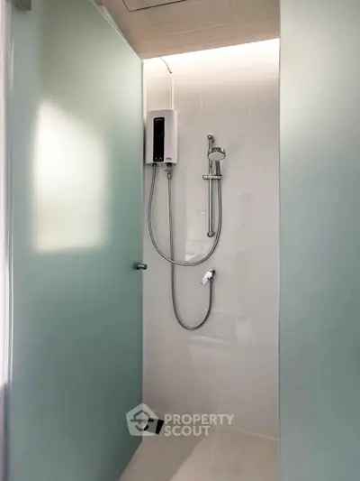 Modern bathroom with sleek shower design and frosted glass panels