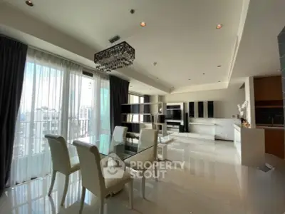 Luxurious open-plan living room with elegant dining area and stunning city views.
