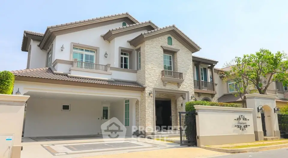 Luxurious two-story house with elegant facade and spacious driveway