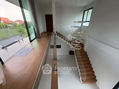 Stunning modern staircase with elegant lighting in a spacious home interior