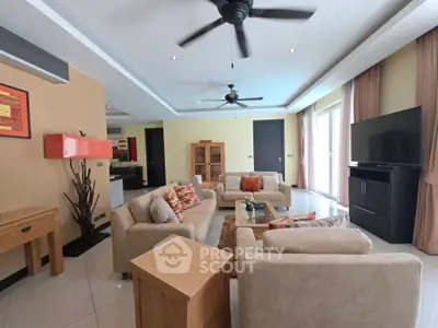 Spacious modern living room with elegant decor and natural light