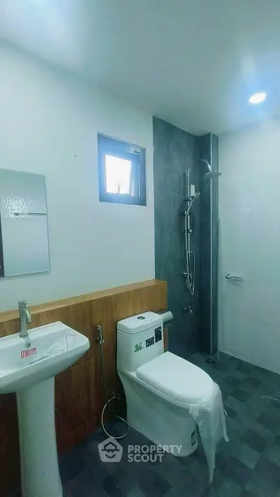 Modern bathroom with sleek fixtures and walk-in shower