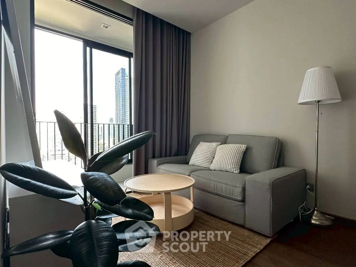 Cozy living room with modern sofa and city view balcony