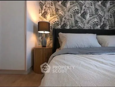 Stylish bedroom with modern decor and elegant lighting