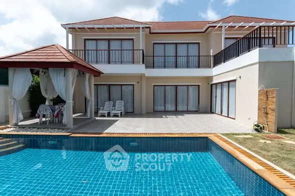 Luxurious villa with private pool and spacious patio, perfect for relaxation and entertainment.