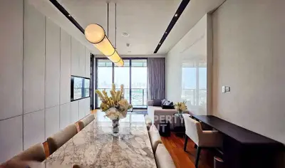 Luxurious modern living room with city view, elegant marble dining table, and stylish decor.