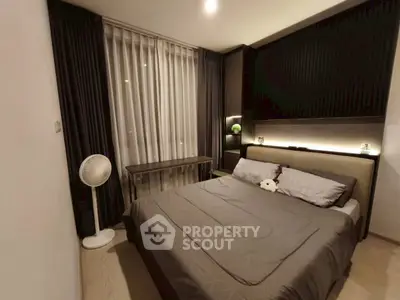 Cozy modern bedroom with elegant decor and ambient lighting