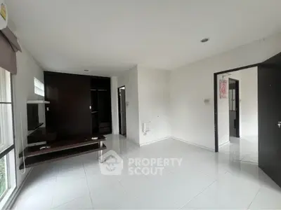 Spacious modern living room with sleek design and natural light