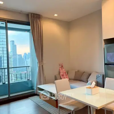 Modern living room with city view and balcony access