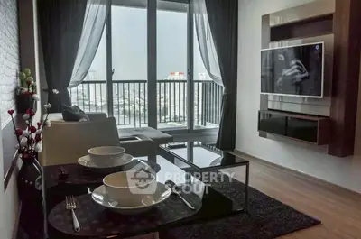 Modern living room with large windows and city view, featuring sleek furniture and wall-mounted TV.