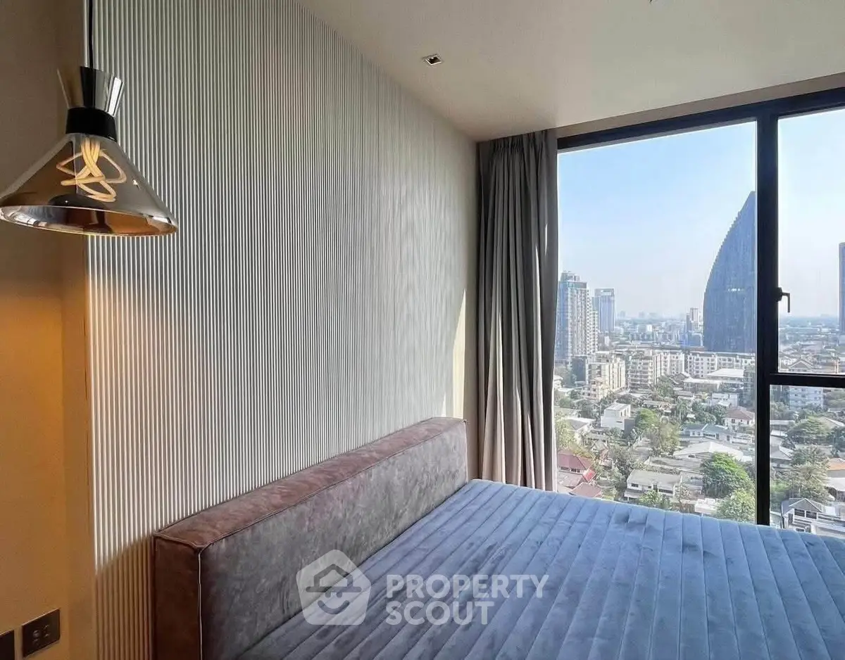 Modern bedroom with panoramic city view and stylish decor