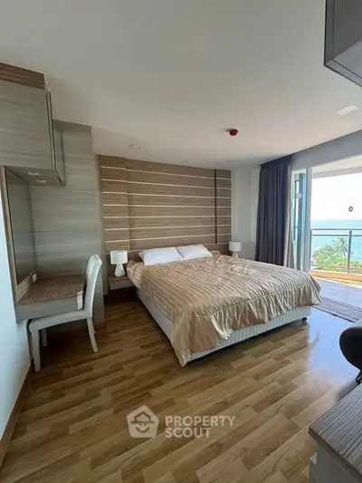 Modern bedroom with ocean view and stylish decor