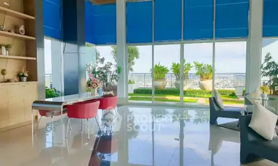 Luxurious living room with panoramic city view and elegant decor