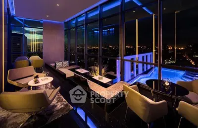 Luxurious modern living room with panoramic city view and stylish interior design.
