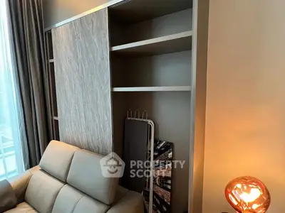 Modern living room with stylish shelving and cozy lighting