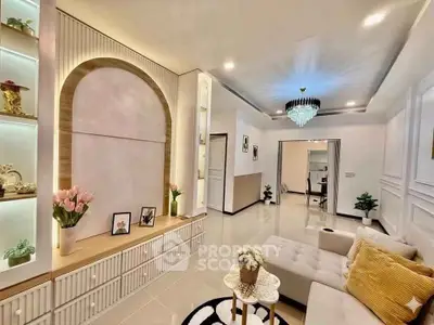 Elegant living room with modern decor, plush seating, and ambient lighting for a cozy atmosphere.