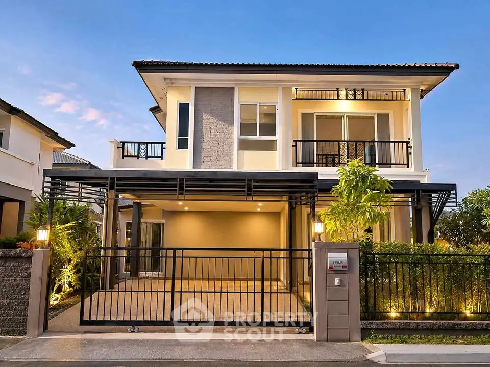 Stunning modern two-story house with spacious driveway and elegant facade, perfect for family living.