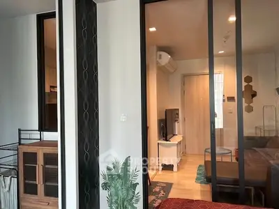 Modern apartment interior with sliding glass doors and stylish decor