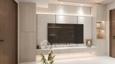 Modern living room with sleek TV unit and ambient lighting