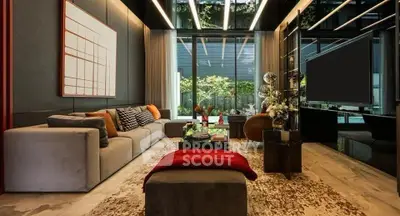 Luxurious modern living room with elegant decor and large windows overlooking a garden.