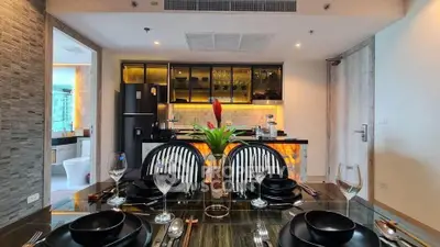 Modern kitchen with elegant dining setup and stylish decor