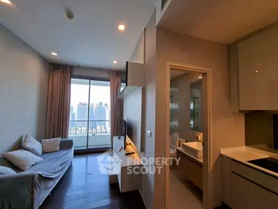 Modern apartment with cozy living room and city view balcony