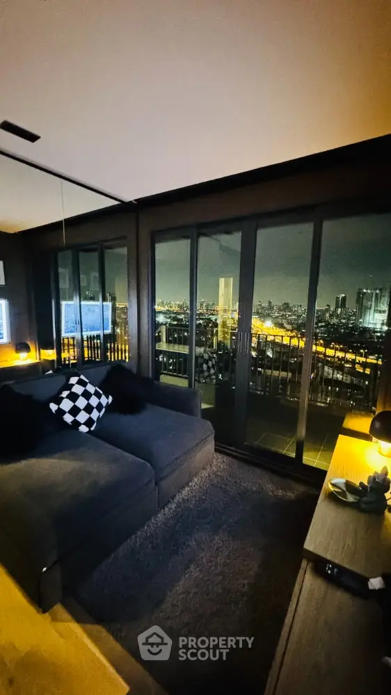 Luxurious living room with stunning city view and cozy modern decor