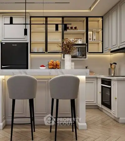 Modern kitchen with sleek cabinetry and stylish island seating