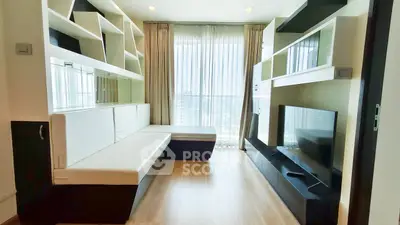 Modern living room with built-in shelves and large window offering city view