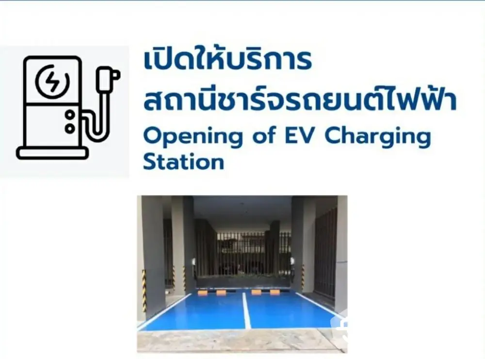 EV charging station opening with designated parking area in modern building