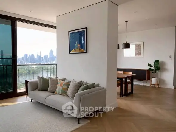 Spacious modern living room with stunning city view and elegant decor