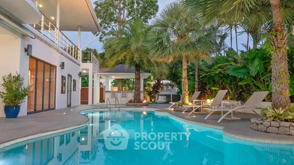 Luxurious tropical villa with stunning pool and lush garden