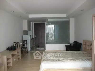 Spacious studio apartment with modern furnishings and open layout