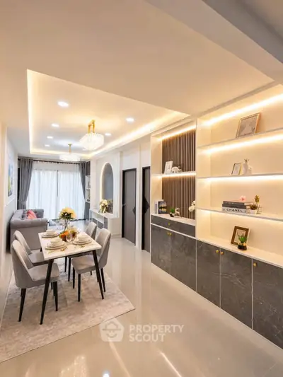 Luxurious modern living room with elegant dining area and stylish shelving, perfect for sophisticated urban living.