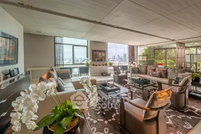 Luxurious living room with panoramic city view and elegant decor