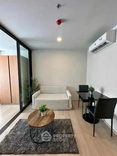 Modern living room with cozy seating and stylish decor