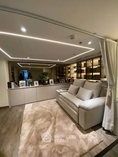 Luxurious living room with modern lighting and elegant decor
