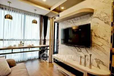 Luxurious living room with marble TV wall and elegant decor