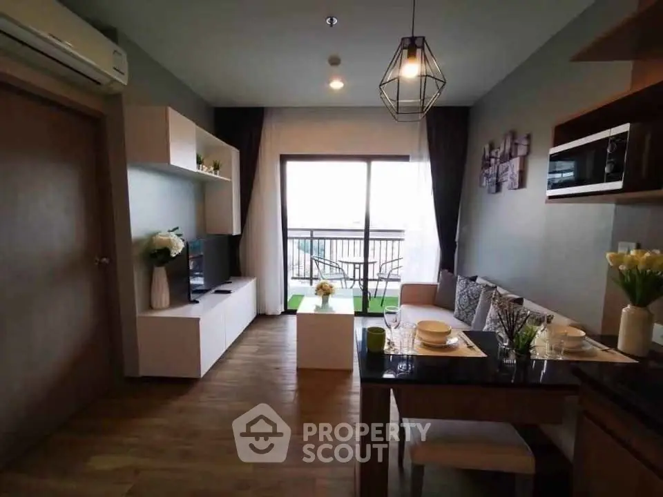 Modern living room with balcony view and stylish decor